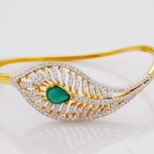 yellow gold bangle with emerald & diamonds